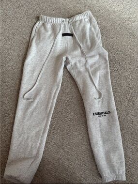 Essentials Light Gray Hoodie with Black Logo Patch